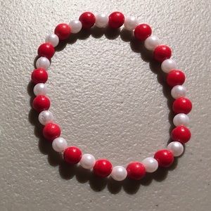 Red and white homemade elastic bracelet
